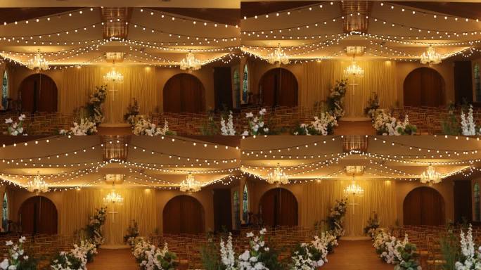 婚礼大厅环境金色椅子十字架灯泡吊灯花朵