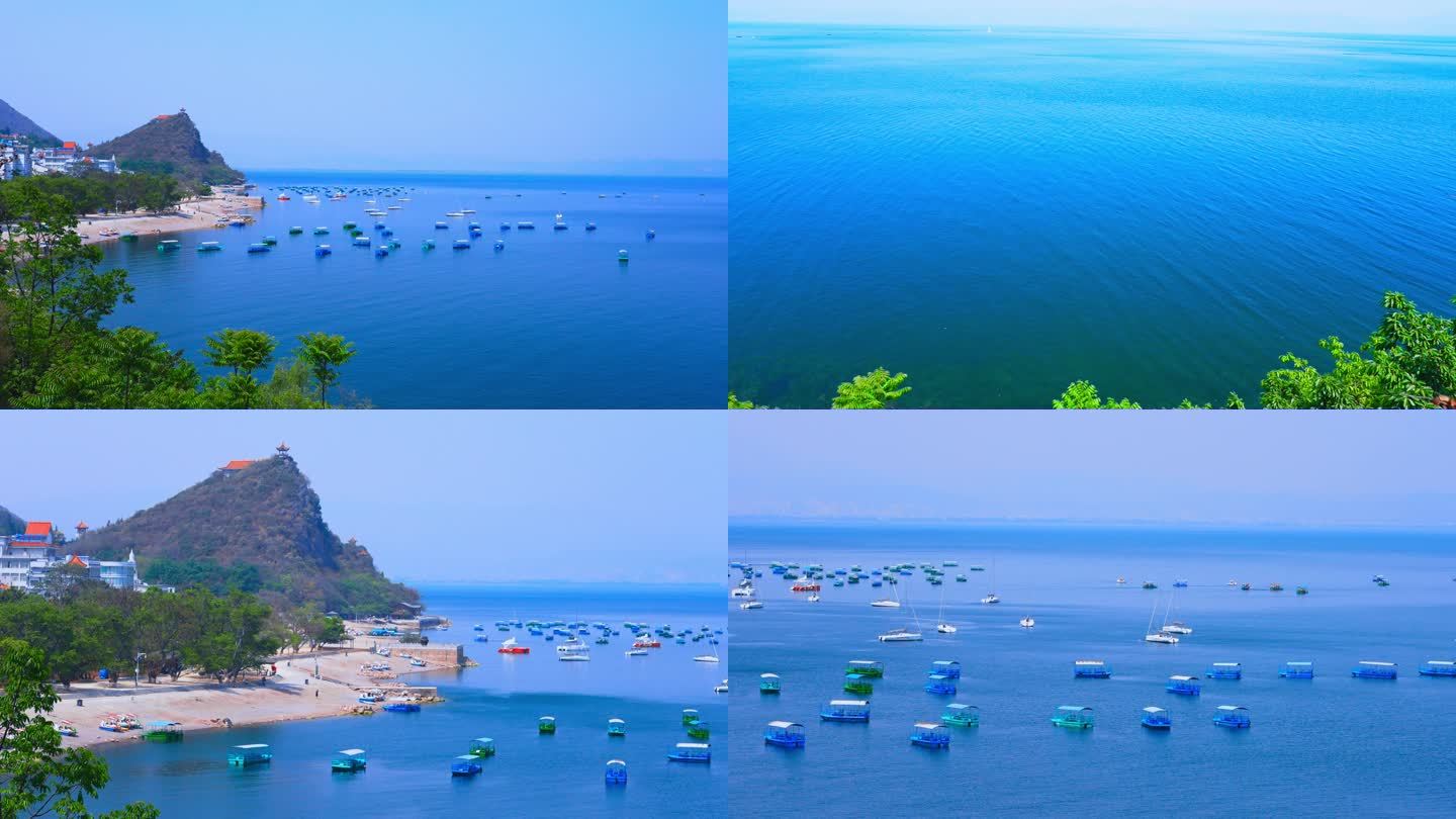 禄充风景区蓝色海湾白色泊船热闹的码头