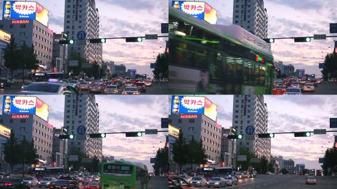韩国首尔傍晚街景路口上下坡道车流直升机