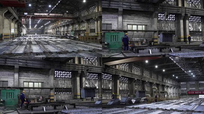 重工业钢铁工厂内部工人操作机器实拍