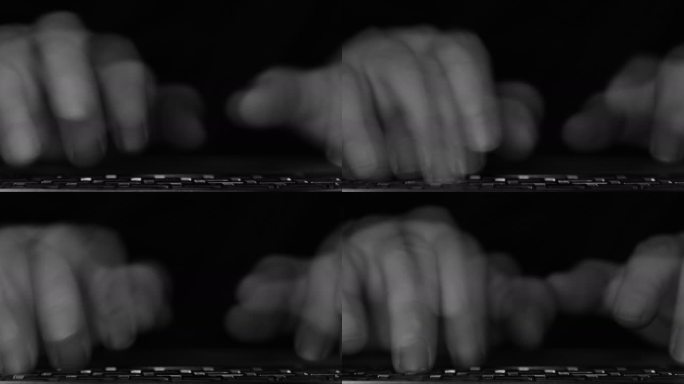 敲打键盘的手指残影黑白