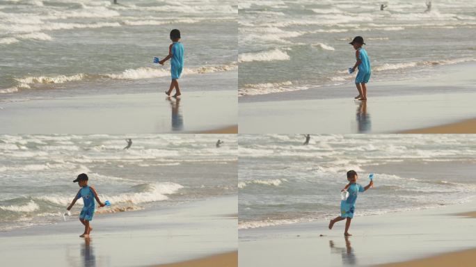 海边玩耍奔跑的小朋友