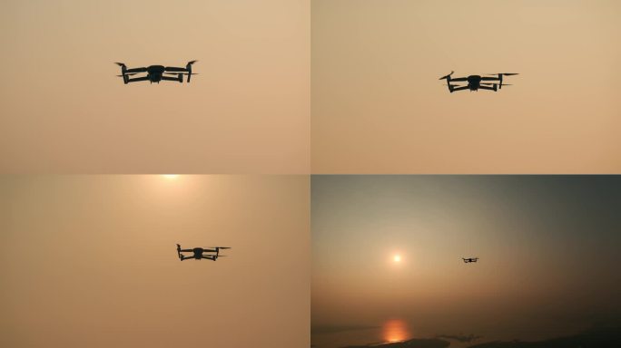 夕阳天空飞翔的无人机航拍器