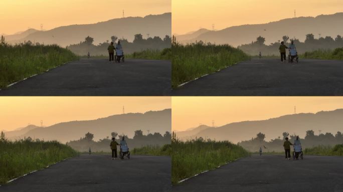 农村留守老人老夫妻早晨晨雾轮椅散步走路