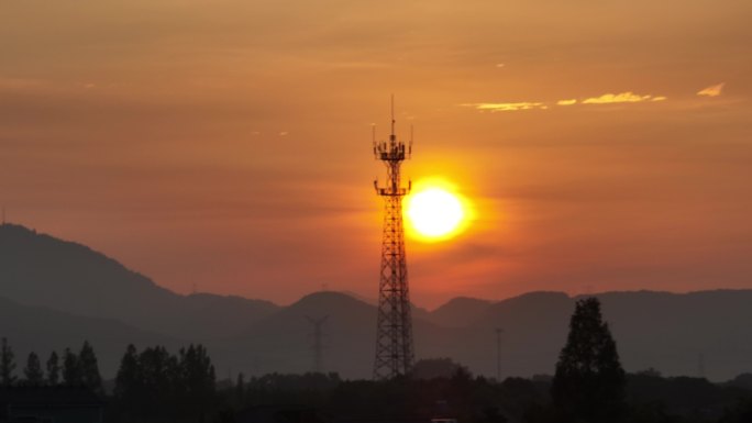 航拍早晨日出朝霞电信移动网络无线信号塔