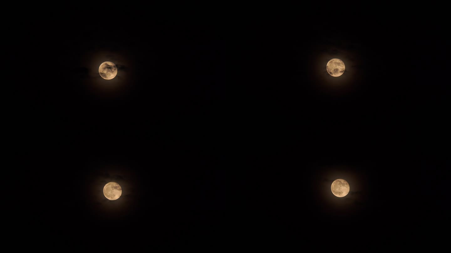 乌云月亮实拍视频金色月亮延时乌云飘过月亮