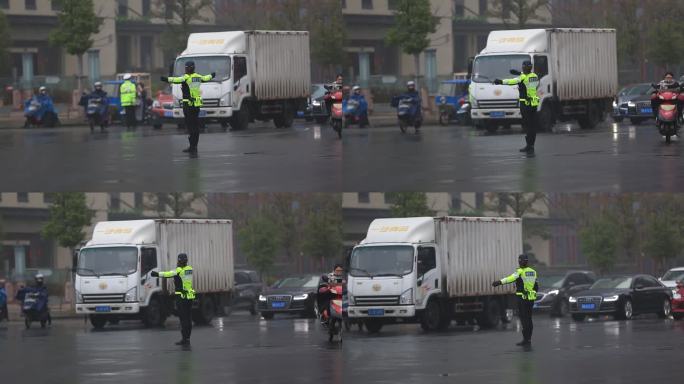 雨天城市道路中间女交警指挥交通车辆通行