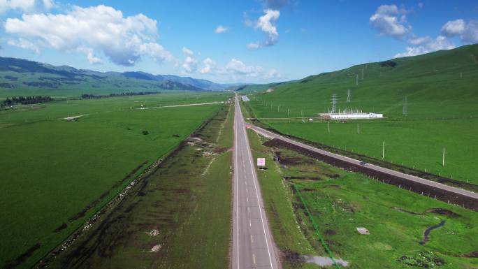 航拍新疆伊犁草原公路