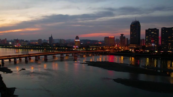 吉林市城市夜景夕阳松花江吉林大桥延时摄影