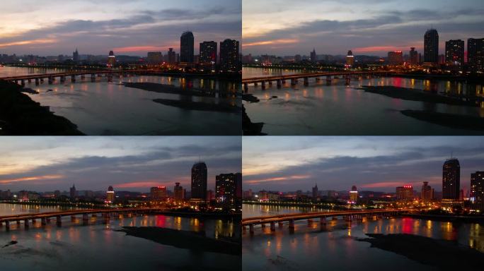 吉林市城市夜景夕阳松花江吉林大桥延时摄影