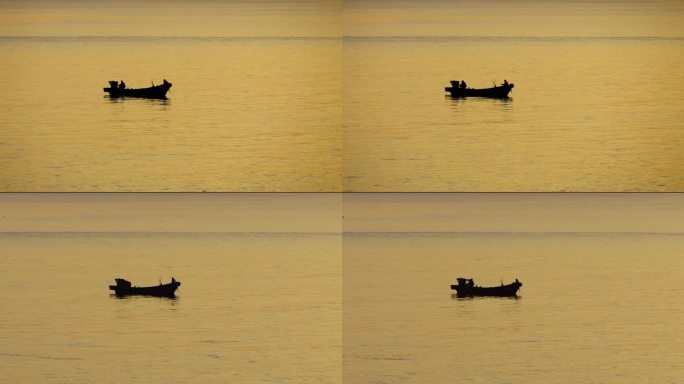 夕阳江面上的渔船