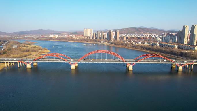 吉林市冬季城市建筑风光松花江江湾大桥航拍
