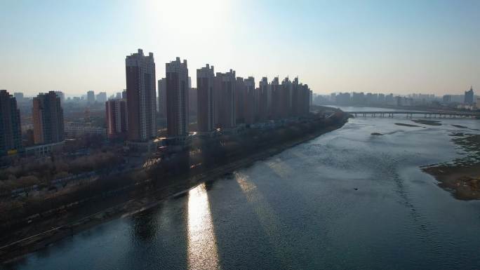 吉林市冬季城市建筑风光松花江江湾大桥航拍