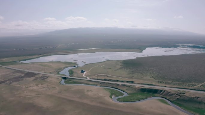 航拍青海省海南州倒淌河与公路