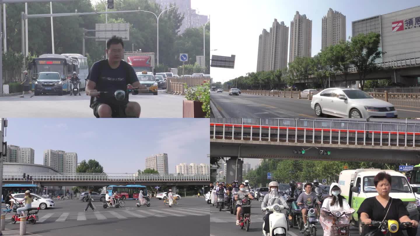 城市夏日高温骑行上班街道车流繁忙生活炎热