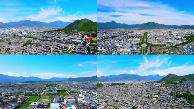 丽江古城古建筑玉龙雪山蓝天白云航拍