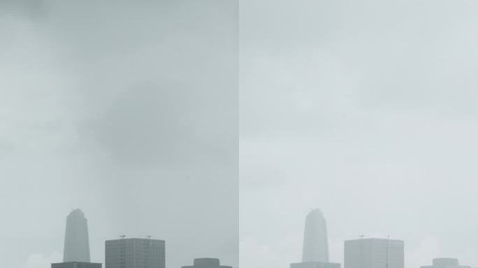 深圳城市建筑群从乌云到下雨到天晴