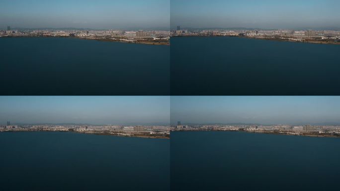 城市规划视频云南昆明滇池蓝色湖面远处城区