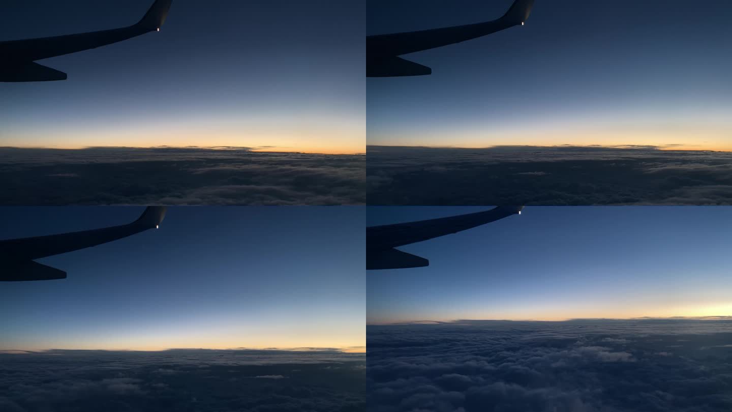 飞机日出飞机窗外日出飞机云层云端景色