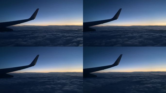 飞机日出飞机窗外日出飞机云层云端景色