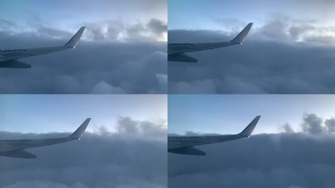飞机起飞飞机空中机翼机舱外景云层之上实拍