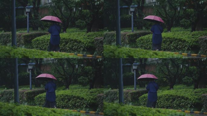 雨中打伞行走