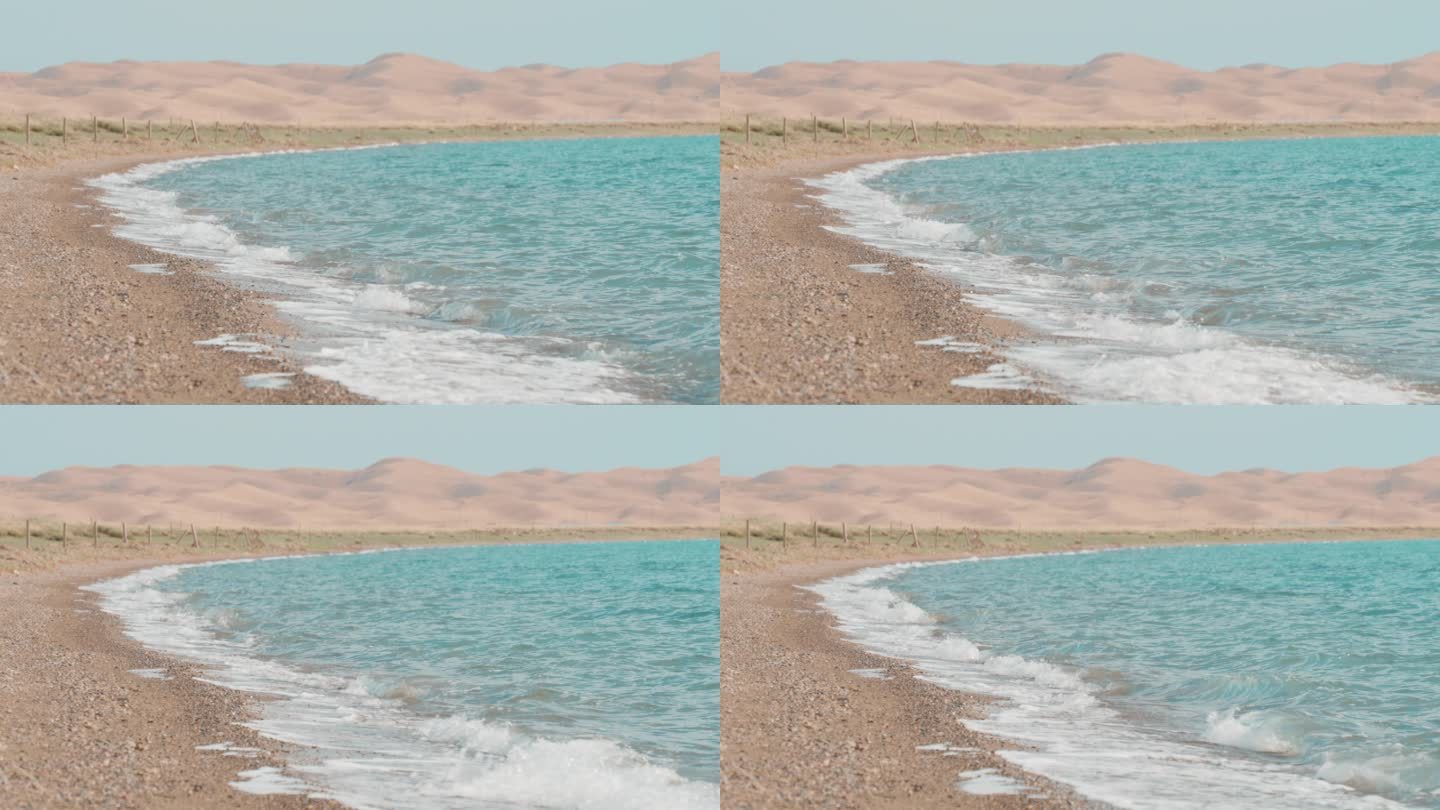 青海湖尕海清澈的湖水与远处的沙丘