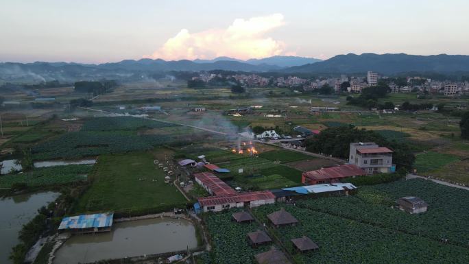 4k视频傍晚农民燃烧田地里的秸秆