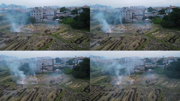 4k视频傍晚农民燃烧田地里的秸秆