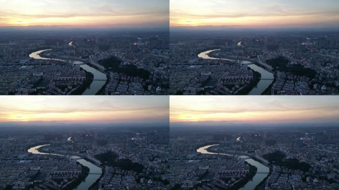 黄昏夕阳下的城市与河流