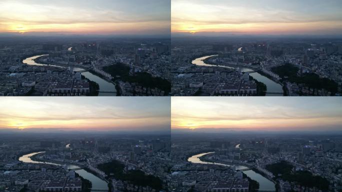 黄昏夕阳下的城市与河流