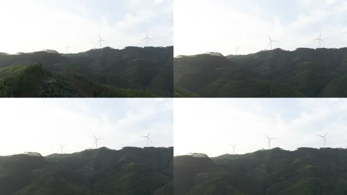 夕阳黄昏山顶风力发电机9