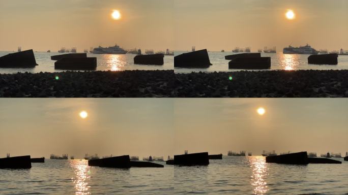 日落黄昏金色夕阳下的海边渔船邮轮波光粼粼