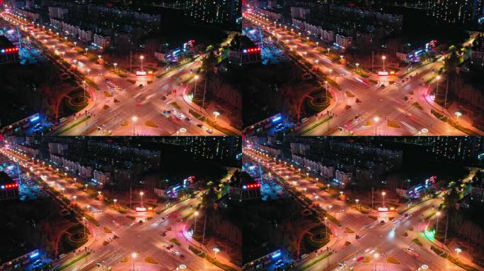 夜晚城市十字路口的车流交通延时航拍视频