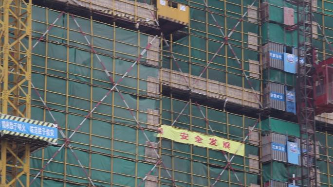 建筑工地安全网脚手架钢结构工人施工建设