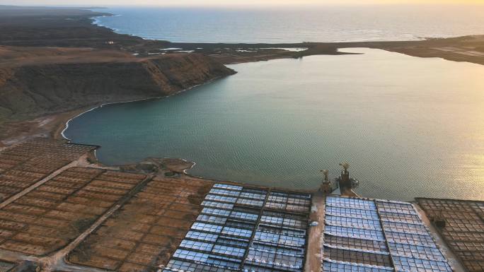 无人机航拍海边海岛海田养殖场日落蓝天白云