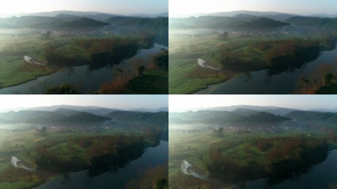 乡村早晨一层薄雾飘在村庄上空美丽风景