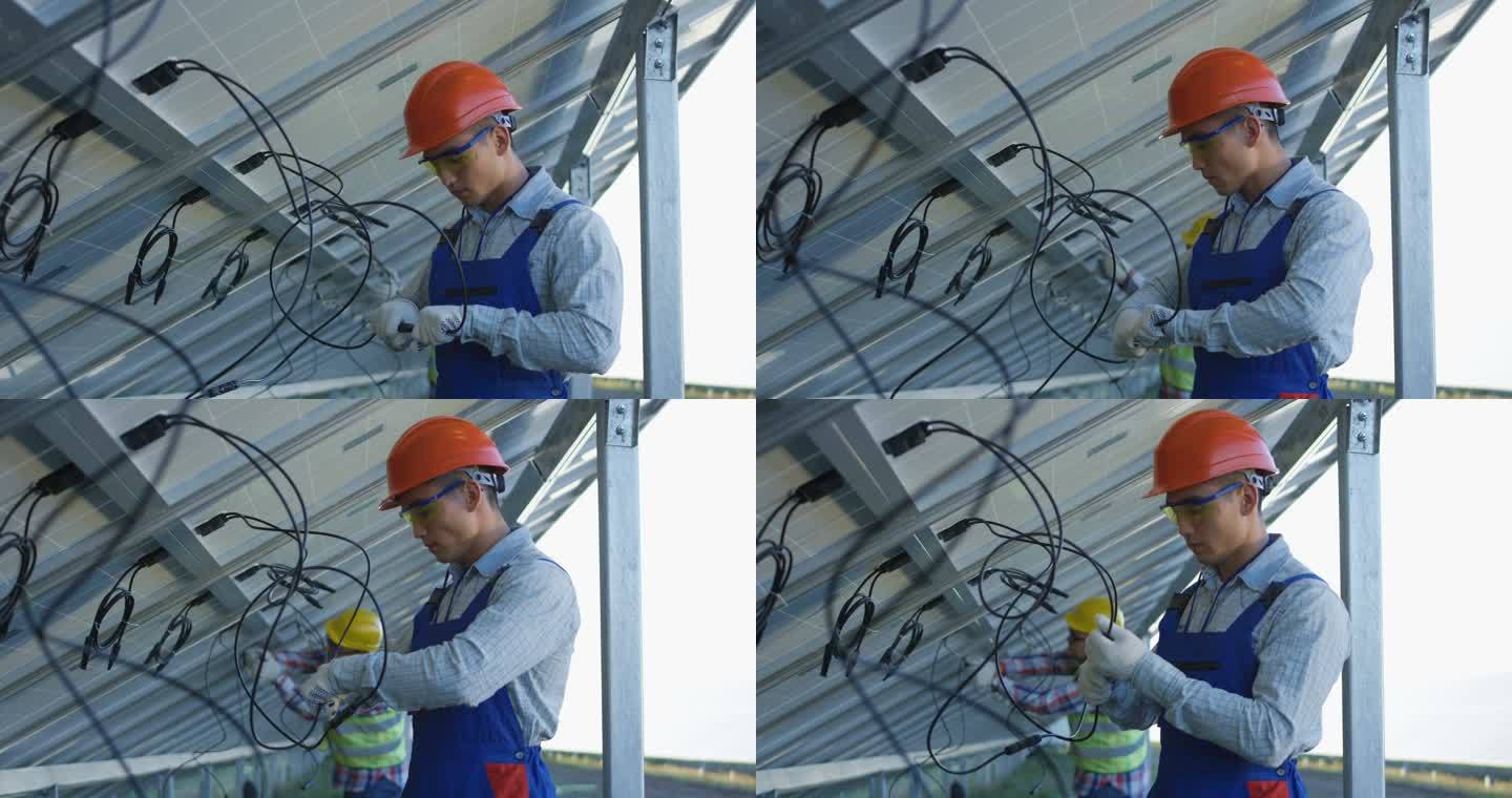 连接太阳能电池板电线的工人