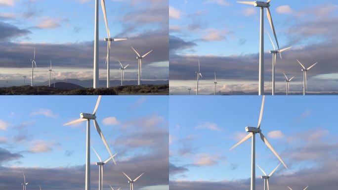蓝天背景下的风力涡轮机，可持续生态能源生产.