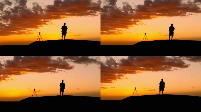 夕阳下的男子摄影师