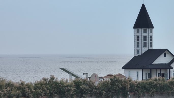 航拍威海西海岸小石岛海洋观测站日落咖啡馆