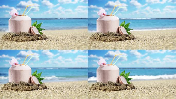 椰子中的可可鸡尾酒矗立在海滩的沙滩上。小海浪从后面涌来。失去焦点的女性腿从旁边走过