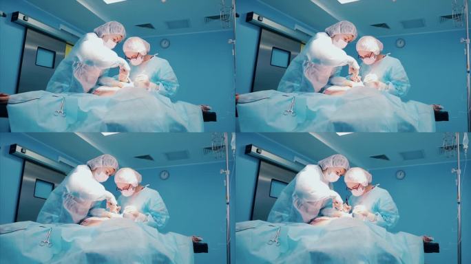 在医院手术室对病人进行侵入性手术的专业外科医生小组。外科医生使用和其他仪器
