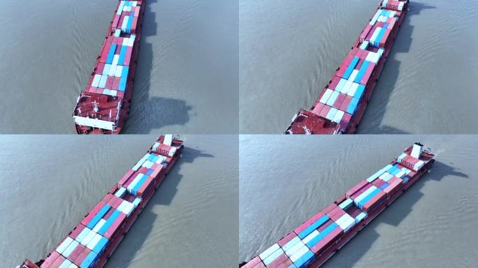 航拍长江中航行的集装箱物流货轮