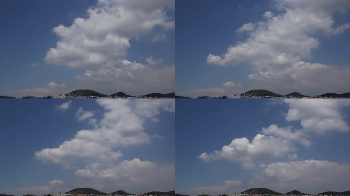 蓝天白云山峦云朵棉花状云朵翻滚的云团