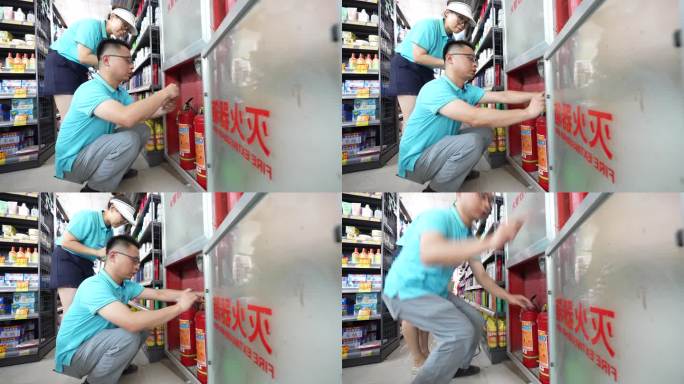 网格员走进商场超市检查消防安全灭火器实拍