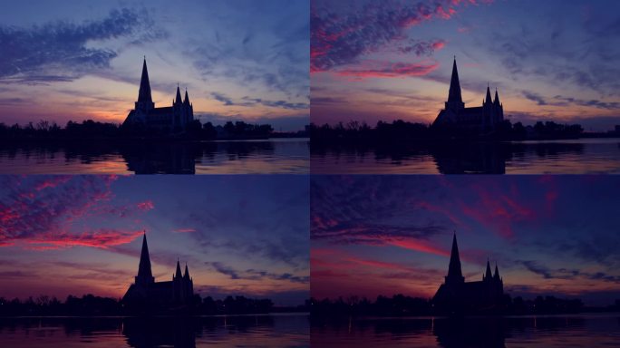 夕阳下的天主教堂延时摄影
