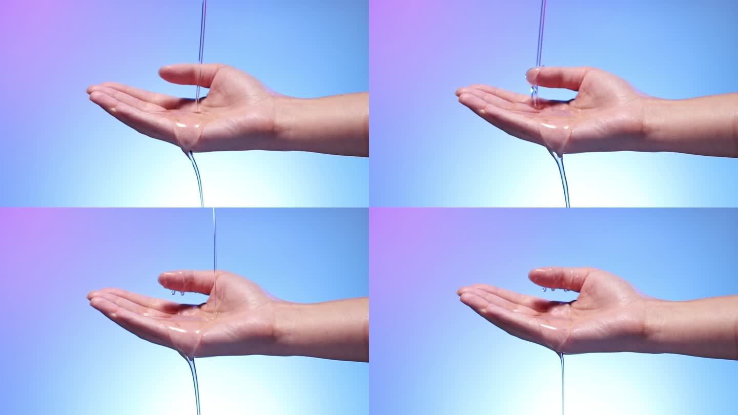 手部特写单手手接液体透明液体粘液慢动作
