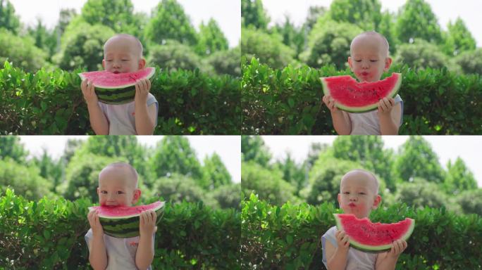 小孩吃西瓜夏季炎热小男孩吃西瓜解暑解渴瓜