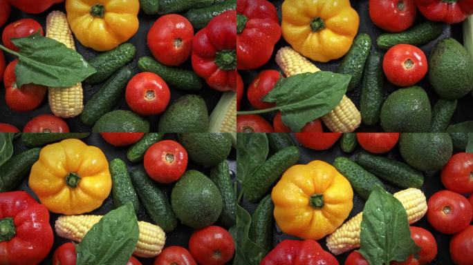 五彩斑斓的新鲜蔬菜:西葫芦，西红柿，黄瓜，甜椒，玉米，还有水滴。B.轮换背景
